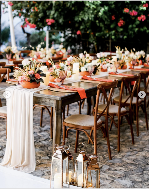 A Rustic Boho Wedding tablescape in Teracotta and neutral colors
