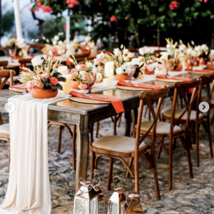 A Rustic Boho Wedding tablescape in Teracotta and neutral colors
